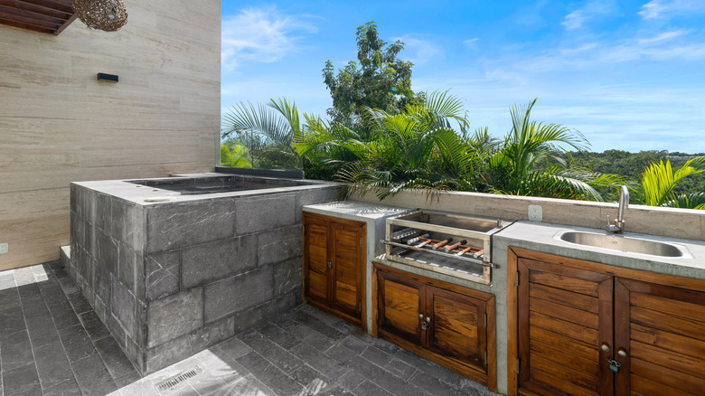 Outdoor kitchen at home with sink