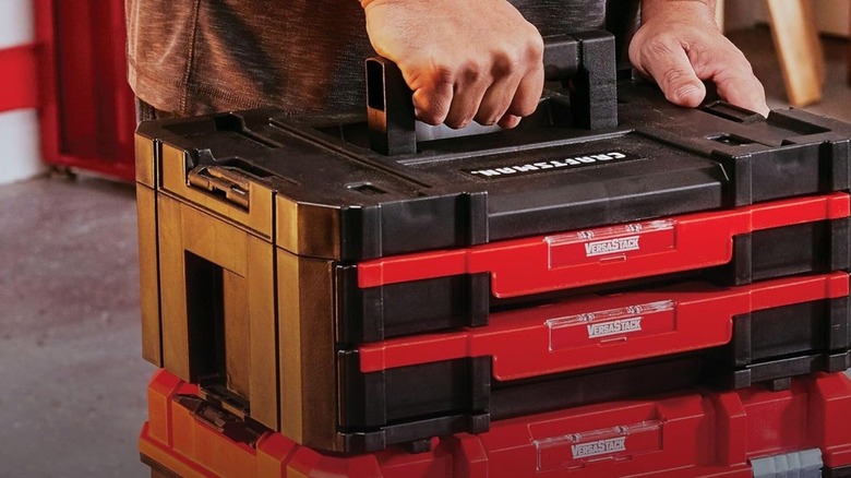 Man holding Craftsman Versastack tool box