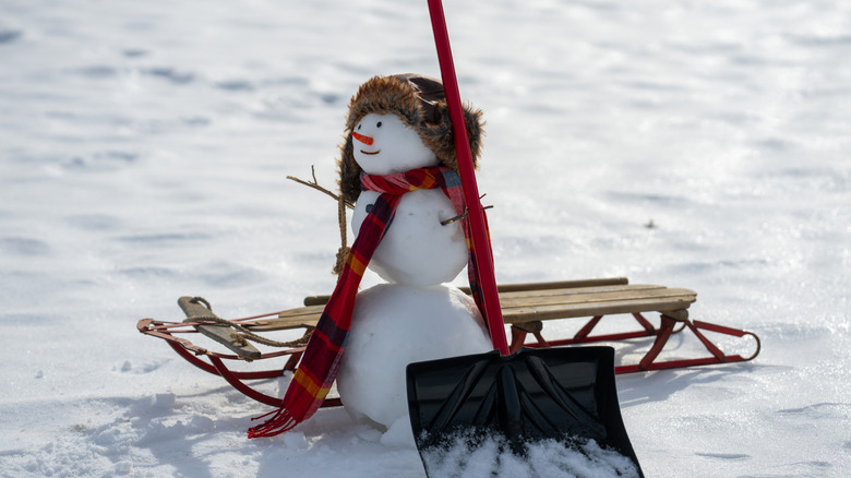 Snowman with shovel