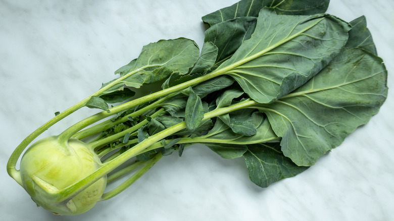 Odd-looking kohlrabi yields a delicious harvest.