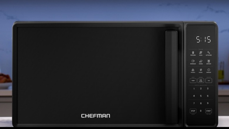 A black countertop oven in a kitchen