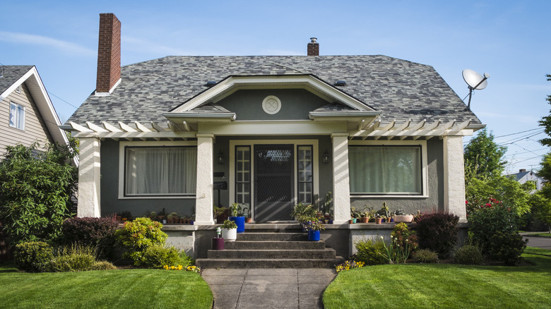 Single-family American craftsman house with blue sky background