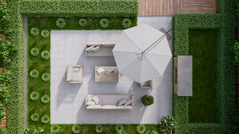 An overhead view of an outdoor garden with pristinely trimmed greenery