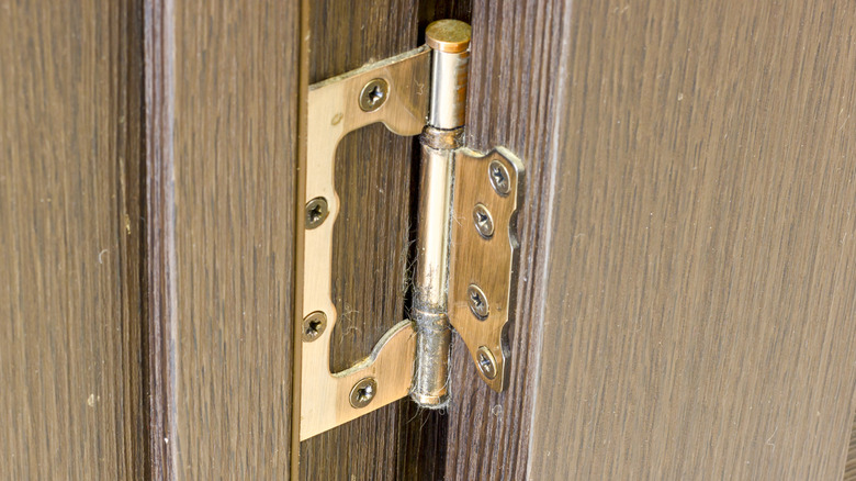 cabinet hinge on wooden door