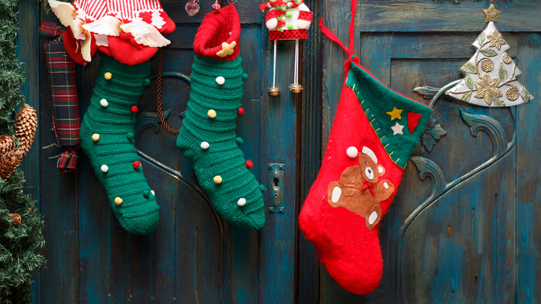 Christmas stocking hung on cabinets