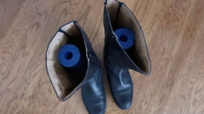 Pair of boots with pool noodles inside
