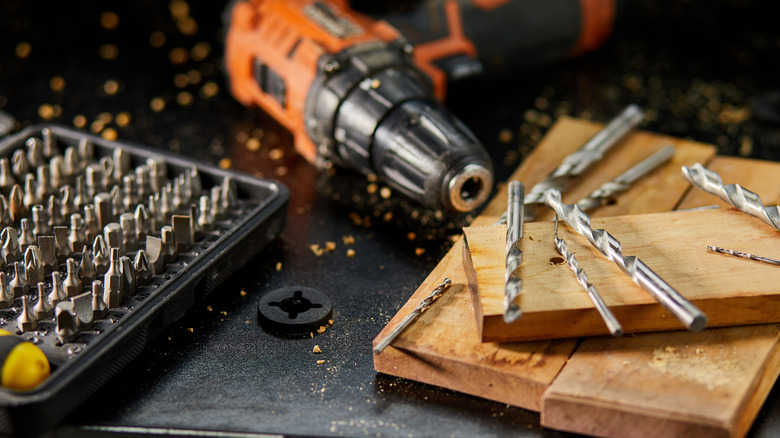 A drill with various drill bits