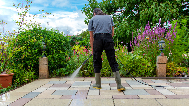 pressure washing back yard 
