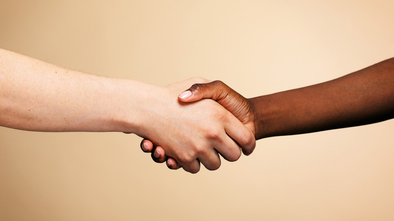 Close-up of a handshake