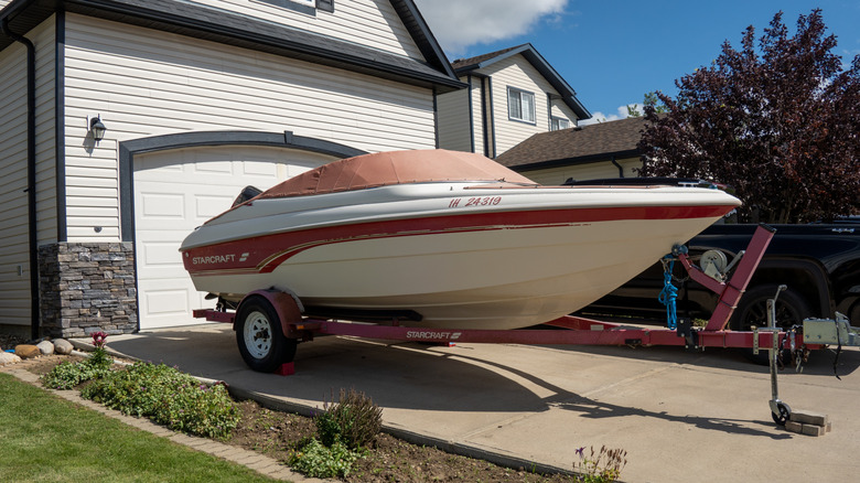 Boat parked in driveway
