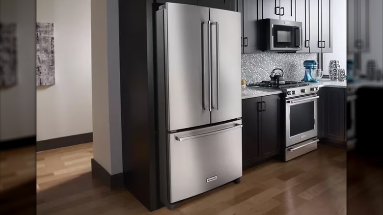 A large stainless steel refrigerator in a contemporary kitchen