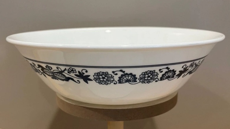Old Town Blue Pyrex serving dish on a pedestal
