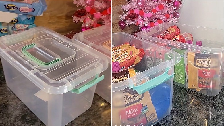Two large plastic totes filled with juice boxes, cookies, and pretzels on a counter by a mini pink Christmas tree.