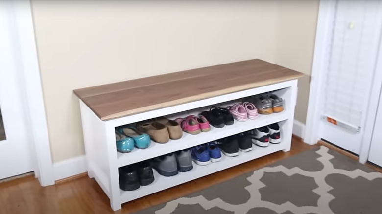 Bench seat with a shoe rack underneath