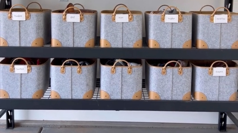 Organizer bins on a shelf with shoes in them
