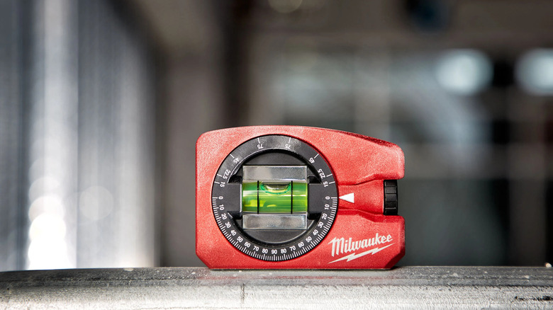 Milwaukee's 4-inch Pocket Level on a metal surface