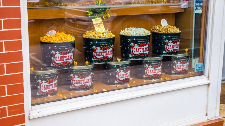 popcorn tins in shop window