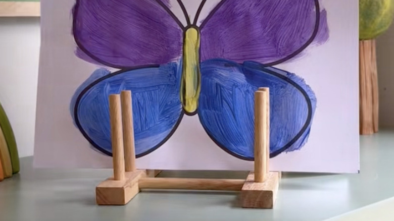 IKEA OSTBIT holding painted pictures
