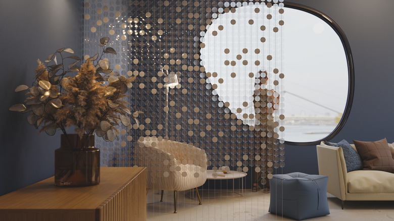 A beaded partition hanging in a room