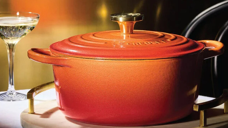A limited edition orange Flame Doree Dutch oven from Le Creuset.