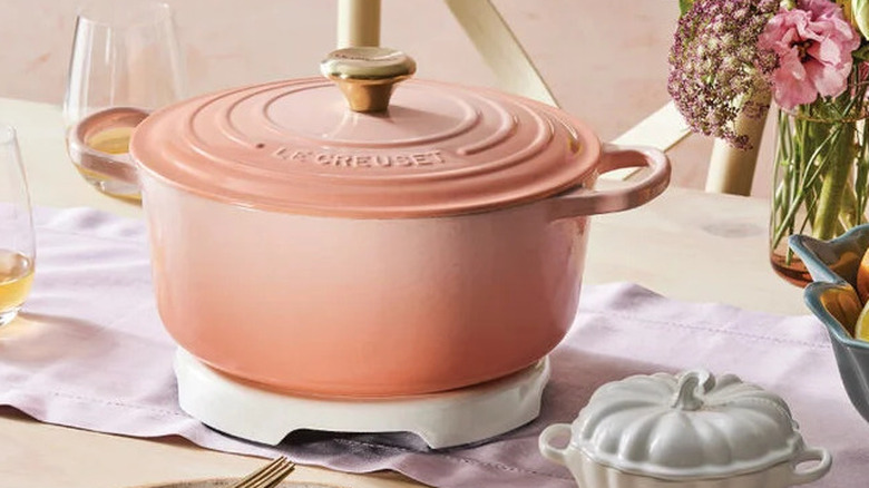 A each toned Le Creuset Dutch oven