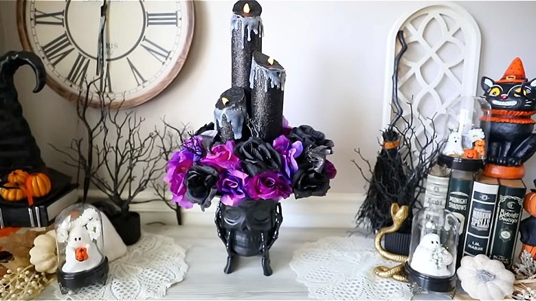 a DIY candle display made with pool noodles and LED candles