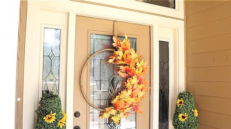 A rustic fall wreath made with twine and leaves