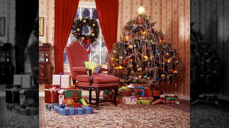 A 1970s Christmas tree covered in tinsel and lametta in a traditional lounge