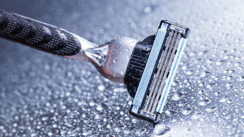 A razorblade covered in moisture 