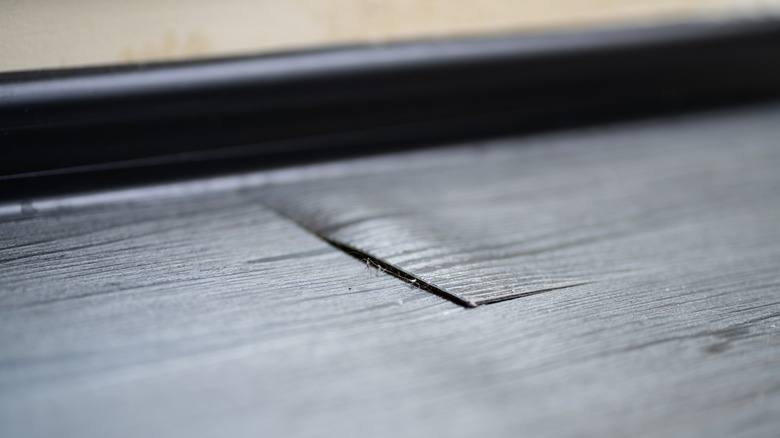 A buckling vinyl floor