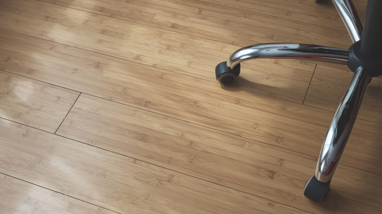 A vinyl floor might creak as a chair slides across it