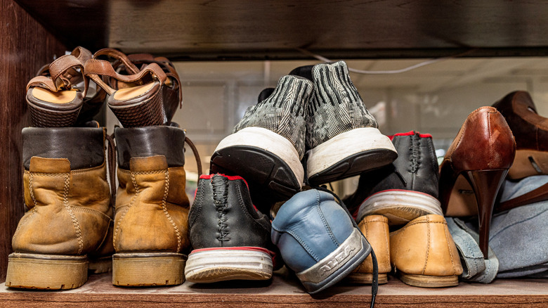 Older shoes on a shelf