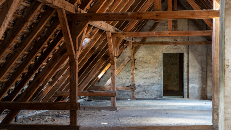 Interior of an old attic with wooden beams