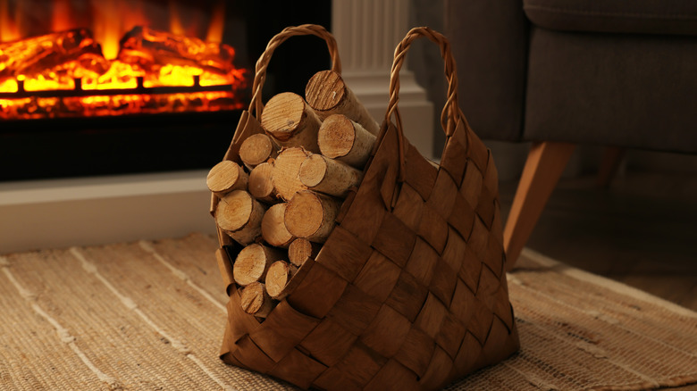 indoor wood basket near the fire