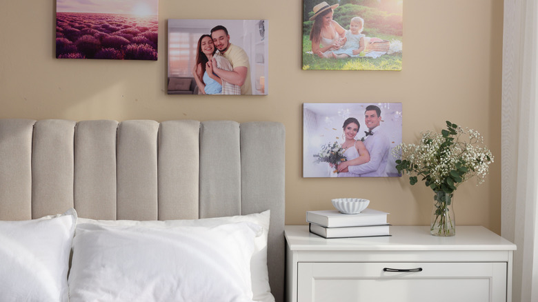 Family photos above bed