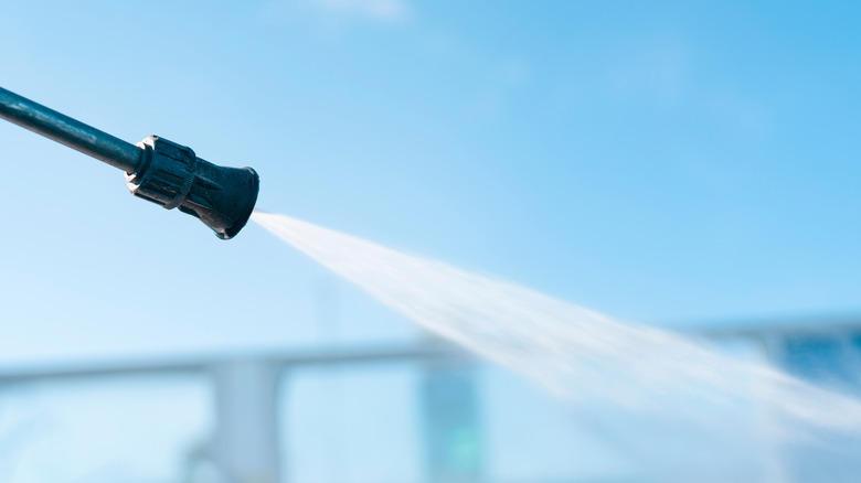 Close up of intense power washing spray