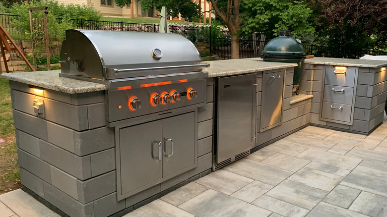 Outdoor kitchen with grill and countertop
