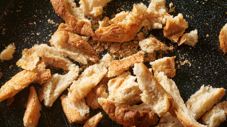 Dry breadcrumbs on a work surface