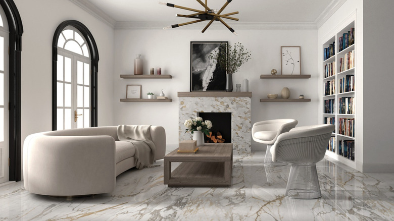 Florida Tile's Alsutra tile in Imperial Gold Calacatta on a living room floor