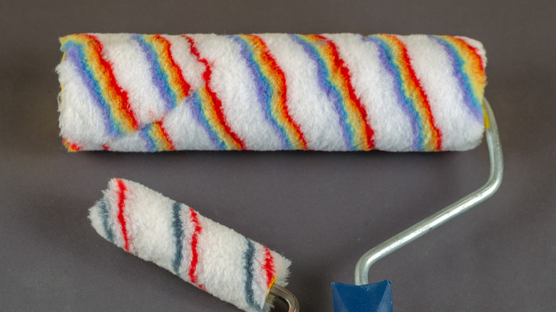 A large and small multicolored paint roller