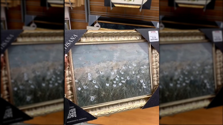 gold framed painting in store