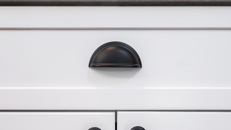Cup style drawer pull in black