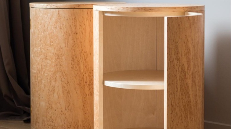 A pair of handcrafted birch burl cylindrical night stands