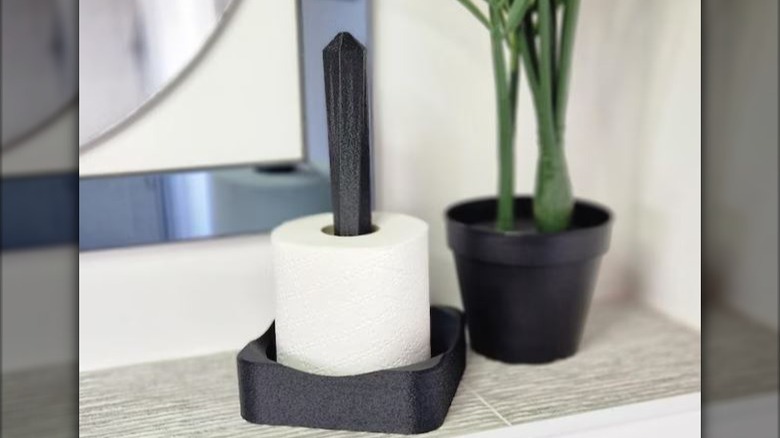 3D printed freestanding countertop holder beside plant