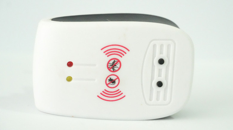 An ultrasonic repeller for rodents or pests on a white background