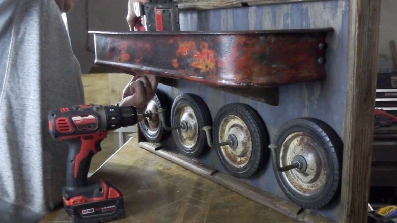 Coat rack made from old wagon parts
