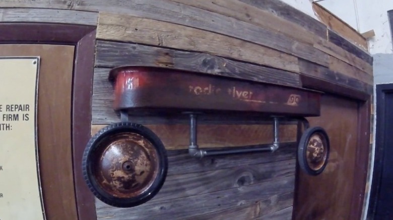 Radio flyer wagon on wall for quirky storage decor