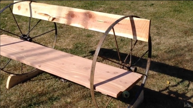 Cedar bench made with old wagon wheels