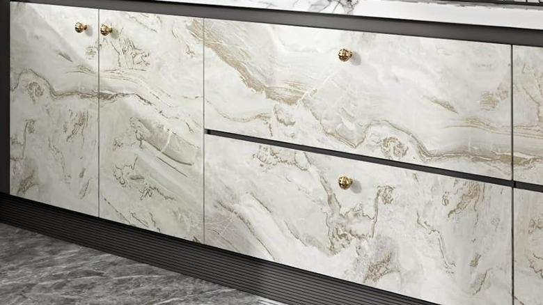 Cabinets with marble stone fronts.