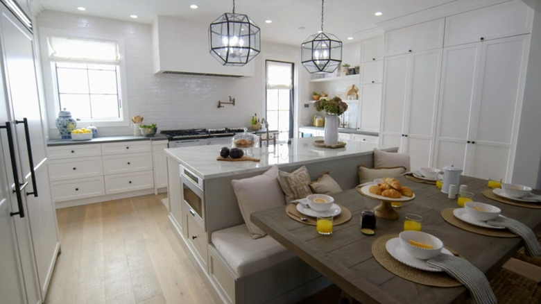 A modern kitchen with an oversized island.
